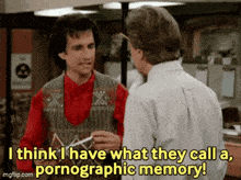 two men are talking to each other and one of them is saying " i think i have what they call a pornographic memory "