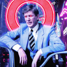 a man in a suit and tie with red eyes stands in front of a neon sign that says " kil "