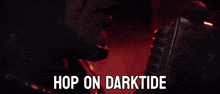 a man singing into a microphone with the words hop on darktide written above him