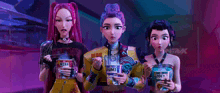 a group of girls are holding up a stack of sumo mix cans in front of their faces .