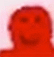 a blurry picture of a red man 's face on a white background .