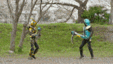 a man in a superhero costume is holding a sword in a field