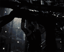 Batman Bane GIF - Batman Bane Lifts And Drop Over Knees GIFs