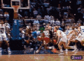 a basketball game is being played with a 3look icon in the corner