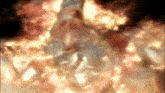 a close up of a person 's face with a lot of fire coming out of it
