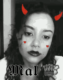 a black and white photo of a woman with the name mal on her face