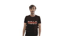 a man with his arms outstretched wearing a black shirt that says rdls