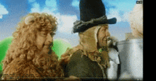 a wizard of oz scene with a lion and a scarecrow