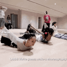 a group of girls are doing stretching exercises in a dance studio and the caption says yes this is my girl group