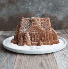 gingerbread house baking snowing gingerbread man