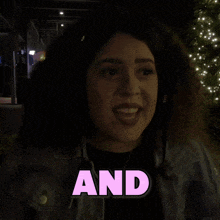 a woman with curly hair is smiling with the words and shagarita below her