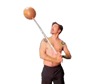 a man without a shirt is holding a hammer above his head