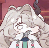 a close up of a cartoon character with white hair and horns holding something in her mouth .