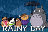 a cartoon of a totoro holding an umbrella with the words " rainy day " below it