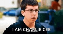 a young boy wearing glasses says i am charlie cee i am mclovin