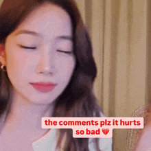 a woman with her eyes closed and the words " the comments plz it hurts so bad "