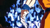 a close up of a person 's hand in front of a blue fire background