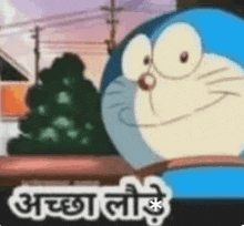 doraemon is smiling and looking at the camera while sitting on a balcony .