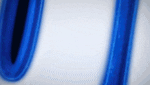 the letter u is painted in blue on a white background
