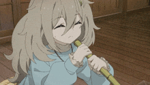 a girl with long hair is holding a bamboo stick in her hand