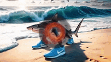 a shark is standing on a beach wearing blue nike shoes .