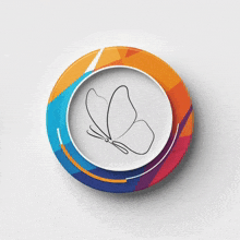 a colorful button with a butterfly and the words lcm family v5