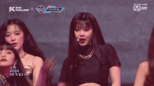 a group of girls are performing on a stage with the words we are k-pop written on the bottom