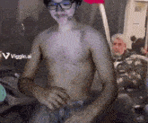 a man without a shirt is standing in front of a viggle.ai sign