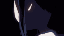 a close up of a girl 's face with a red eye