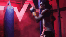 Kicking Sandbag Wiz Khalifa GIF - Kicking Sandbag Wiz Khalifa Weak Song GIFs