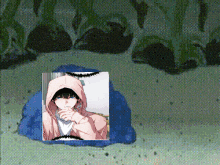 a picture of a person in a hooded jacket is on a blue item