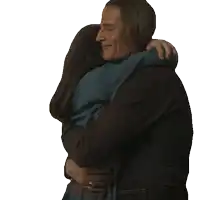 a man and a woman hugging each other with a white background