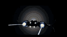 a dark background with a cube in the middle and a light coming out of it