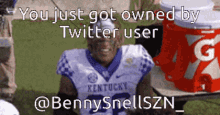 a football player with kentucky on his jersey