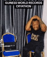 a man in a black shirt that says energy gang