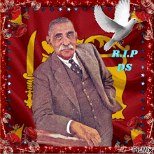 a man in a suit and tie is surrounded by flowers and a flag with the words rip ds on it
