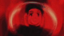 a pixelated image of a person in a red light