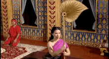 fan woman hatari thailand traditional