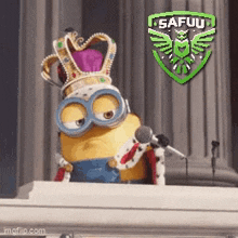 a minion wearing a crown and a robe is standing in front of a microphone ..
