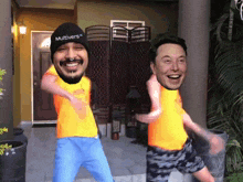 a man wearing a multiverse hat is dancing with a man wearing a yellow shirt