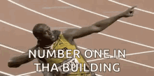 Usain Bolt Posing GIF - Usain Bolt Posing Arms GIFs