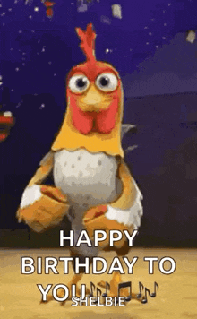 a chicken is dancing with the words `` happy birthday to you '' .
