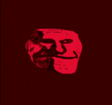 a red and black drawing of a troll face with teeth