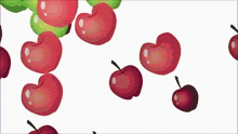 a bunch of red apples and green apples are floating in the air