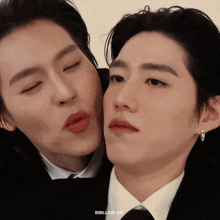 a close up of two men 's faces with the words bbbillkin gif below them