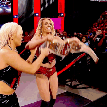 Charlotte Flair Raw Womens Champion GIF - Charlotte Flair Raw Womens Champion Dana Brooke GIFs