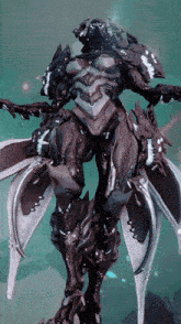 a statue of a creature with wings and a skull on it