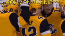 a group of hockey players are huddled together with the words " common connie w " on the bottom