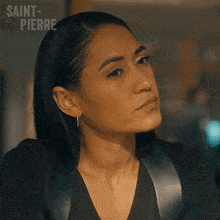 a close up of a woman 's face with saint-pierre written on the bottom right