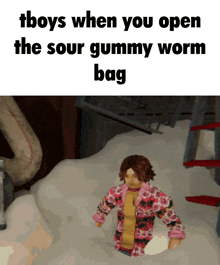 tboys when you open the sour gummy worm bag with a picture of a doll